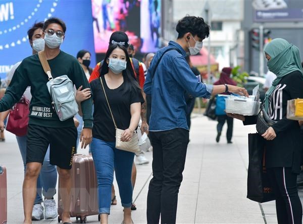 Thêm 130 ca, số người mắc Covid -19 ở Malaysia vượt mốc 1.000 - Anh 1