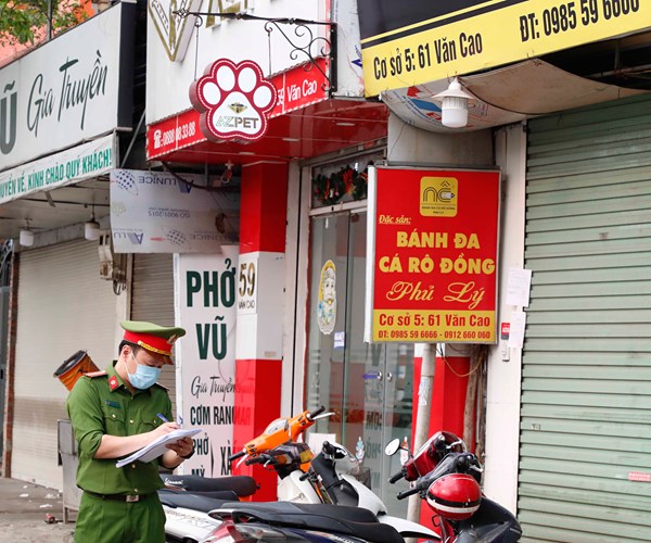 Ha Noi: Cac ho kinh doanh ung ho quyet dinh tam dung hoat dong - Anh 13