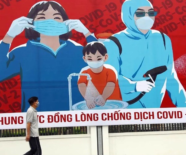 Báo Mỹ nhận định Việt Nam ứng phó dịch Covid-19 rất hiệu quả - Anh 1