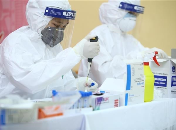 WHO và Anh chứng nhận bộ kít xét nghiệm Covid-19 của Việt Nam - Anh 1