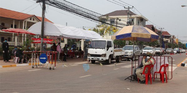 Người nước ngoài nhập cảnh Lào sau ngày 3.5 tự trả chi phí cách ly - Anh 1
