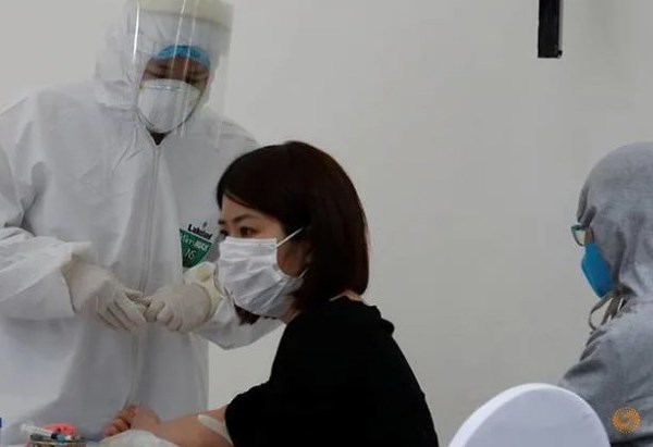 Chuyên gia quốc tế chỉ rõ yếu tố “then chốt” giúp Việt Nam đánh bại dịch Covid-19 - Anh 1