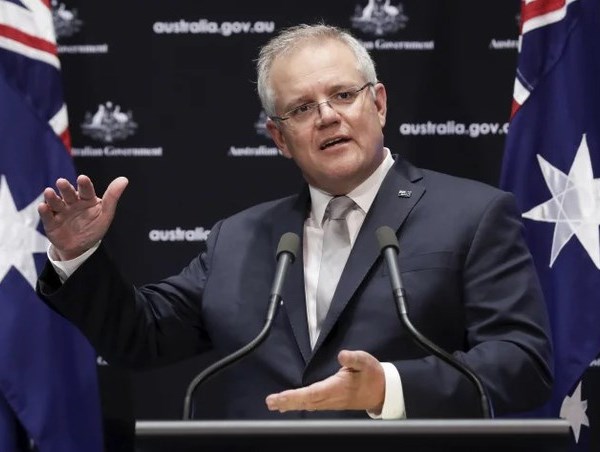 Australia sẽ nới lỏng giãn cách xã hội sớm hơn dự kiến - Anh 1