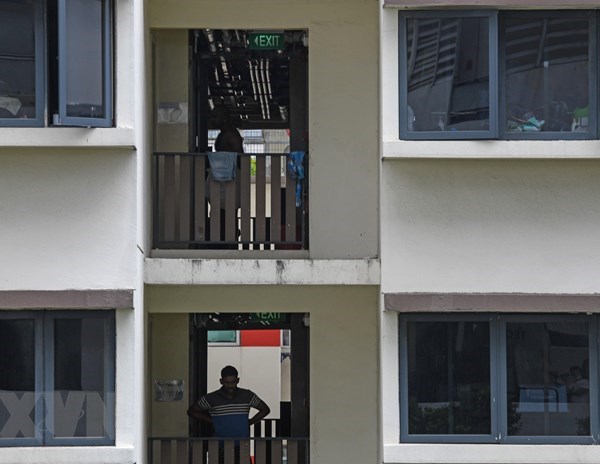 Singapore tiếp tục ghi nhận thêm hàng trăm ca nhiễm Covid-19 mới - Anh 1