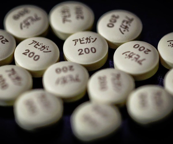 Nhật Bản đóng góp khoản tiền lớn cho bào chế vaccine trị Covid-19 - Anh 1