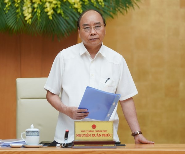 Thủ tướng: Tiếp tục giảm ‘giãn cách xã hội’ thế nào để trở lại hoạt động bình thường - Anh 1