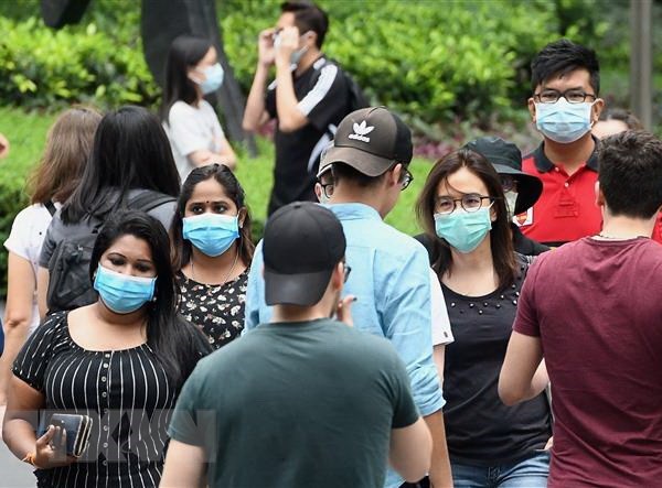 Số ca mắc Covid-19 ở Singapore có thể lên tới 40.000 người - Anh 1