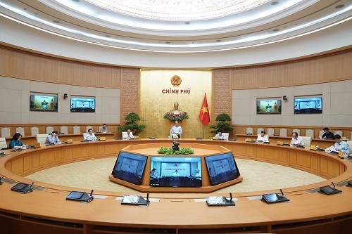 Thủ tướng chủ trì họp Thường trực Chính phủ về Covid-19 - Anh 2