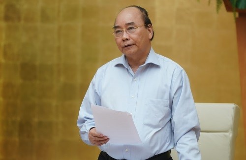 Thủ tướng chủ trì họp Thường trực Chính phủ về Covid-19 - Anh 1