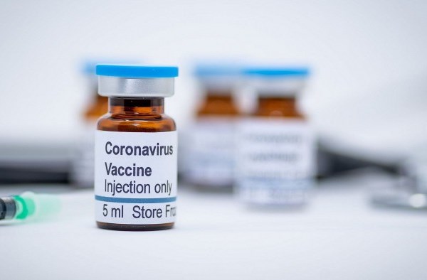 WHO: Vaccine và thuốc cần được chia sẻ công bằng để đánh bại Covid-19 - Anh 1