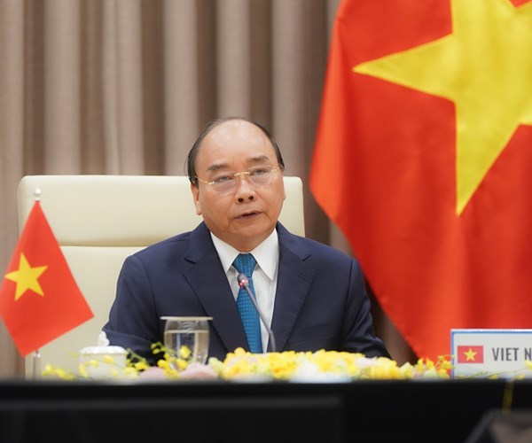 Thủ tướng: Tăng cường đoàn kết quốc tế, ứng phó với đại dịch Covid-19 - Anh 1