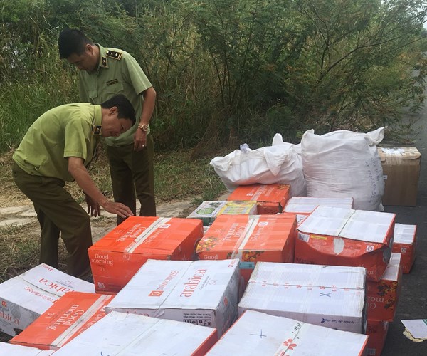 Xử lý gần 24.000 vụ buôn lậu, hàng giả - Anh 1