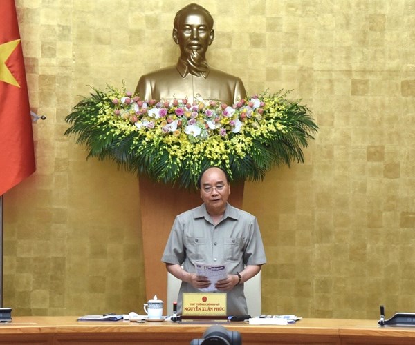 Thủ tướng: Tính toán chặt chẽ trước khi quyết định giãn cách xã hội - Anh 1