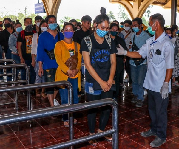 Lào tăng cường các biện pháp ngăn chặn làn sóng Covid-19 mới - Anh 1