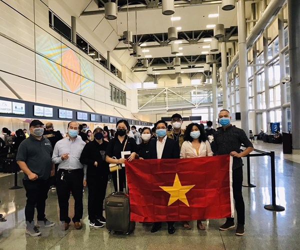 Đưa gần 270 công dân Việt Nam từ Australia và New Zealand về nước - Anh 1