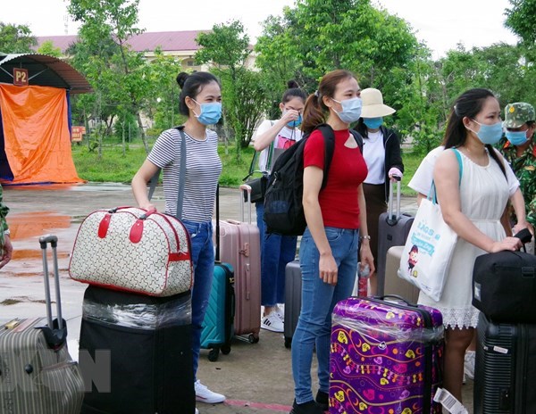 146 công dân từ Singapore về nước hoàn thành cách ly tại Sóc Trăng - Anh 1
