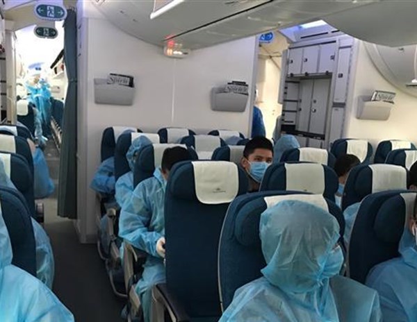 Đưa gần 350 công dân Việt Nam từ Australia và New Zealand về nước - Anh 1