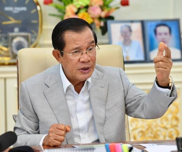 Campuchia bất ngờ bùng phát dịch Covid-19 ngay trung tâm thủ đô - Anh 1