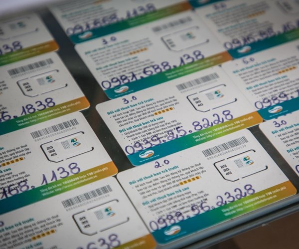 Các nhà mạng Việt tiếp tục 'bắt tay' xử lý dứt điểm vấn nạn SIM rác - Anh 1