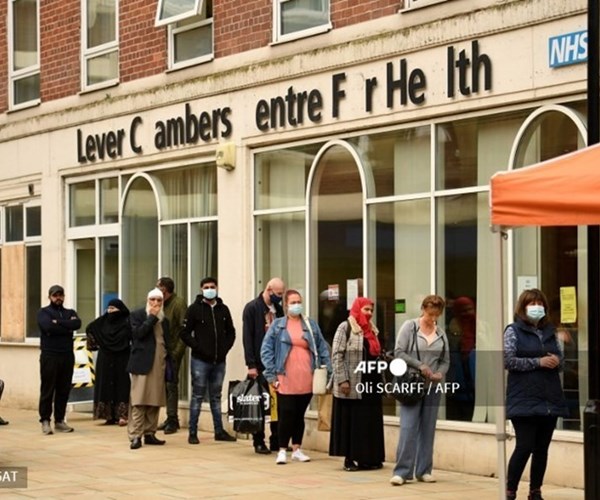 Hơn 50% người Anh trên 30 đã tiêm ít nhất một liều vaccine Covid-19 - Anh 1