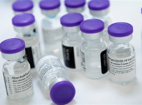 Tổng thống Mỹ công bố chi tiết kế hoạch chia sẻ vaccine với nước khác - Anh 1