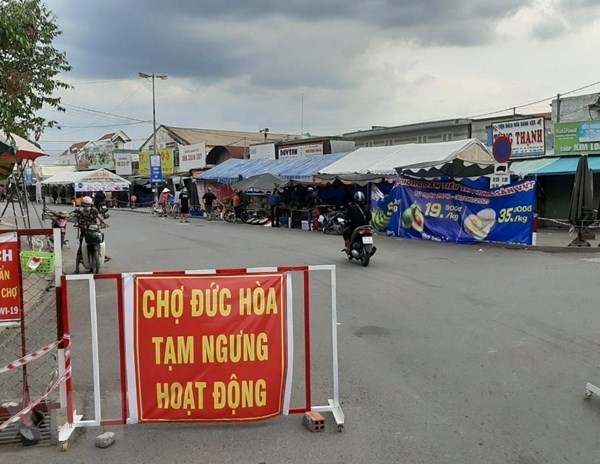 Long An áp dụng các biện pháp giãn cách xã hội trong phạm vi toàn tỉnh - Anh 1