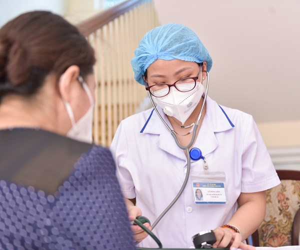 Hà Nội bắt đầu đợt tiêm chủng vắc xin Covid-19 quy mô lớn - Anh 5