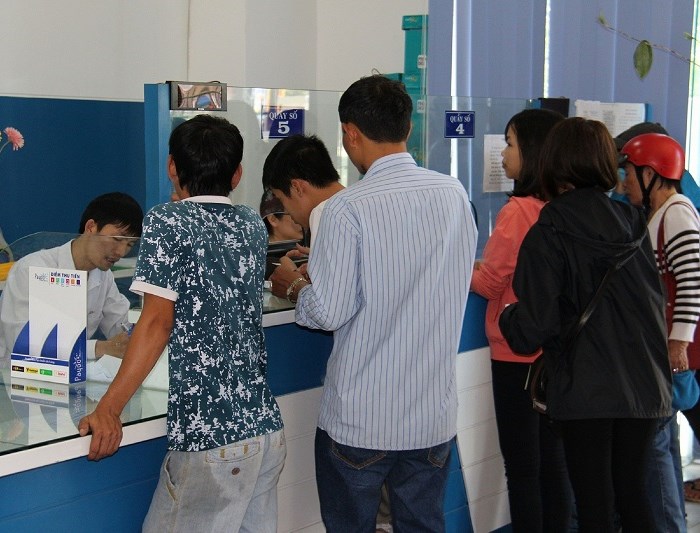 PC Khánh Hòa: ​Trang bị 57 máy tính xách tay cho các điểm thu tiền điện - Anh 1