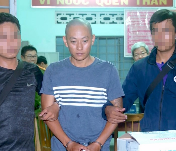 Hai nghi phạm cướp 4,5 tỷ từ ngân hàng - Anh 1