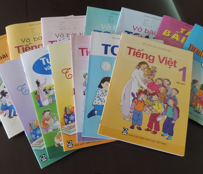 Cách giải thích của Bộ GD&ĐT về SGK cho thấy: Sẽ không chấm dứt hết tình trạng lãng phí? - Anh 1